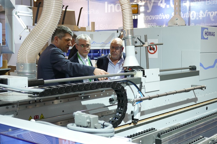 Roberto Pardini/ Sales Area Manager (first left) Homag Italia, impressed visitors with machine technology of all sizes, from small to large.