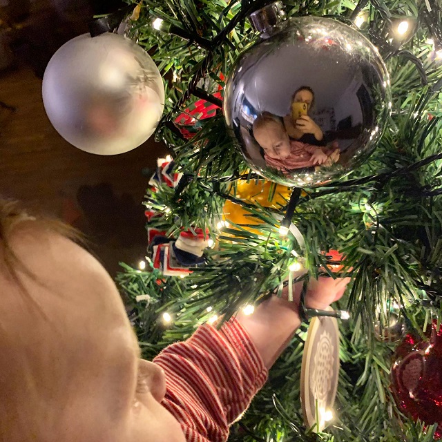 Four-month-old Ricky Bassetti admires his first Christmas tree. Photo Arch. Ilaria Stroppa