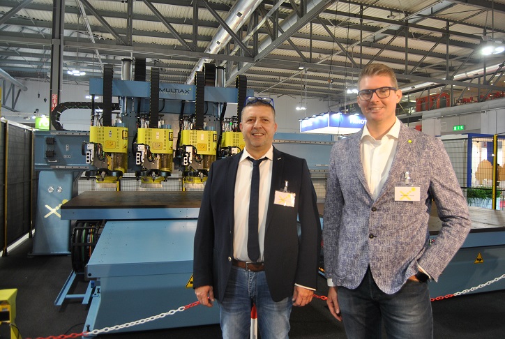 Multiax at the Xylexpo's stand: on left, Luca Chersovani (Business Develop. Italia) and Ing. Davide Meneghel (Electrical & Software Engineering). Photo Datalignum