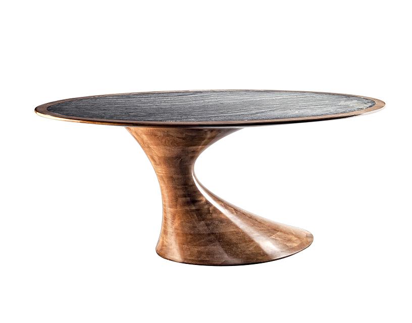 ANNIBALE COLOMBO presents sculpture table Bend: high quality cabinet making chief protagonist of iSaloni in Milan.